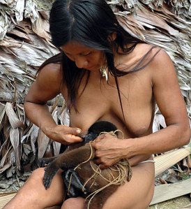 indigenous-woman-nursing-monkey.jpg