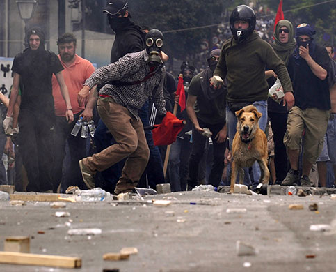 5-May-Demonstrators-throw-014.jpg